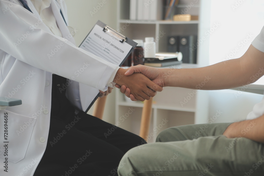 Hands of unknown woman-doctor reassuring her female patient, close-up. Medicine concept Hands of unknown woman-doctor reassuring her female patient, close-up. Medicine concept