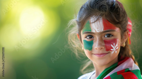 little girl, a Mexican flag is painted on her cheeks, blurred bokeh background, empty space for text