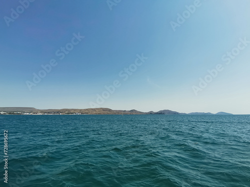 Sunny Summer Landscape of Sea, Mountains, and Sky with No People