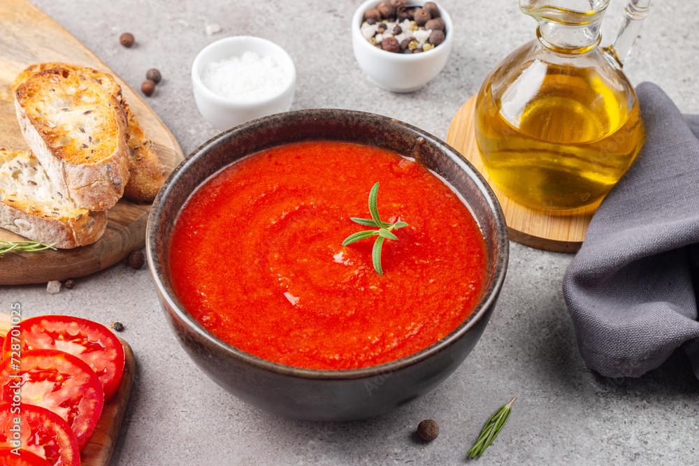 Tomato soup or sauce with rosemary. Healthy, vegan and dieting lunch and dinner concept. Gazpacho. Tomato soup or sauce with rosemary. Healthy, vegan and dieting lunch and dinner concept. Gazpacho.