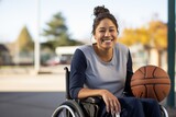 Portrait of a smiling young woman in a wheelchair with a basketball outdoor