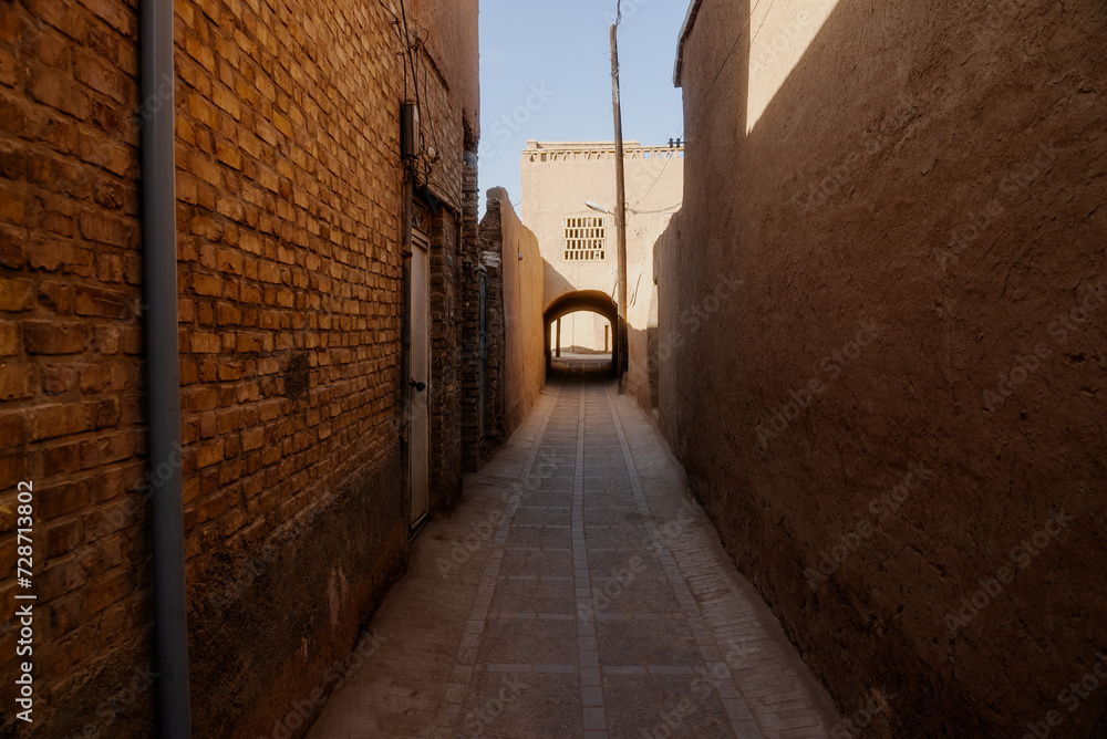 Historic city of Yazd with famous wind towers -Old step with traditional clay arches in the city of Yazd, Iran