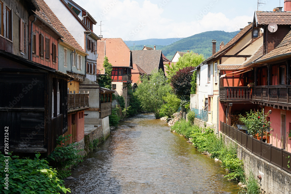Kaysersberg-Vignoble historic Alsace town with traditional timbered houses above river, popular tourist destination in France