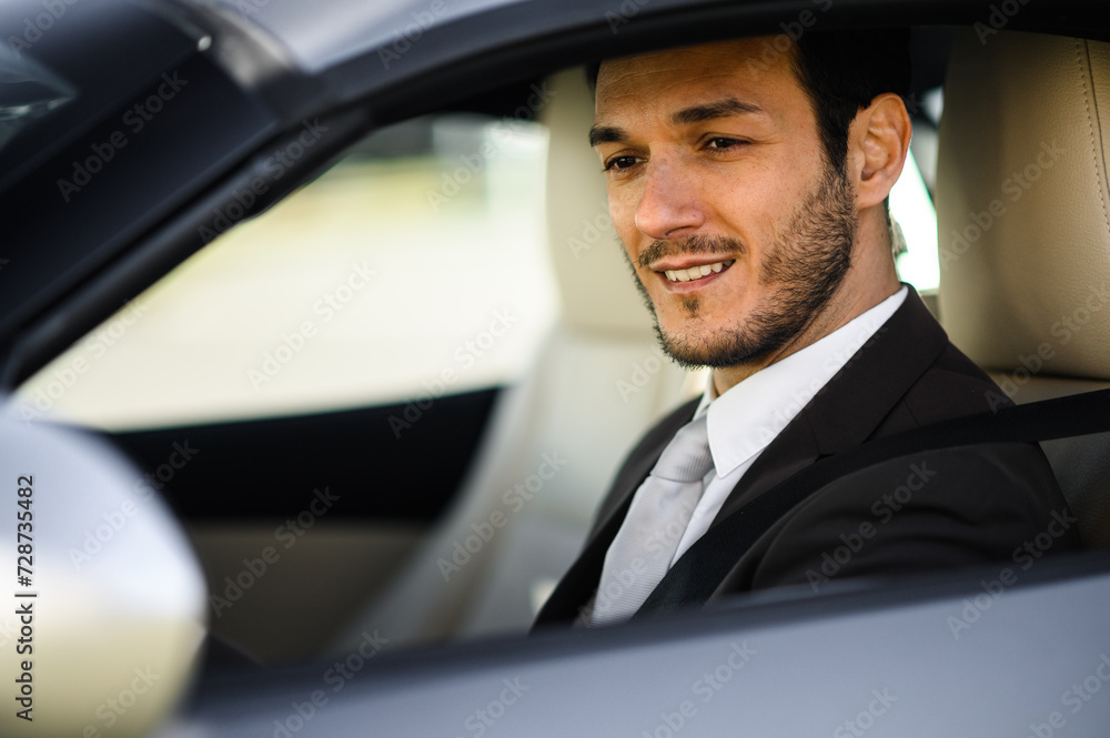 Confident businessman in luxury car Confident businessman in luxury car