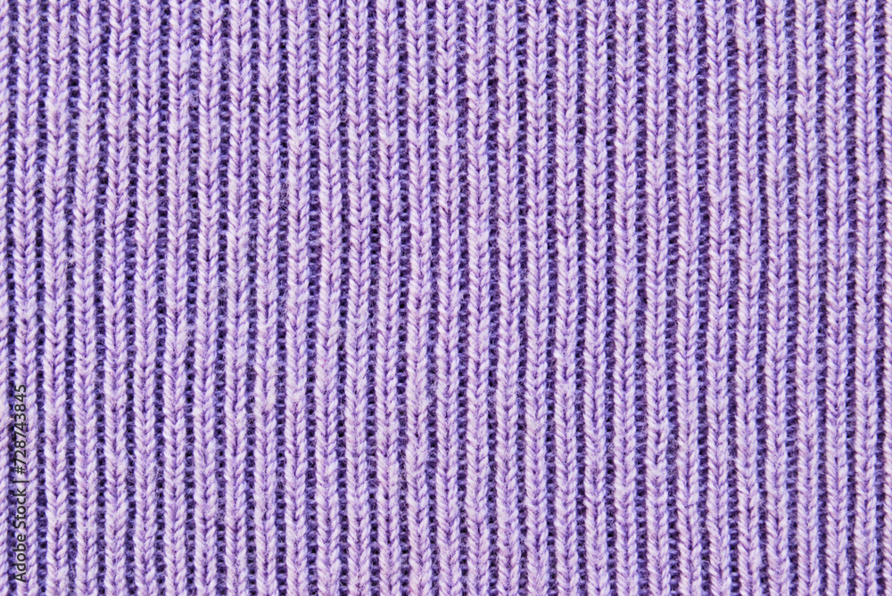 Soft purple color ribbed knit fabric pattern close up as background
