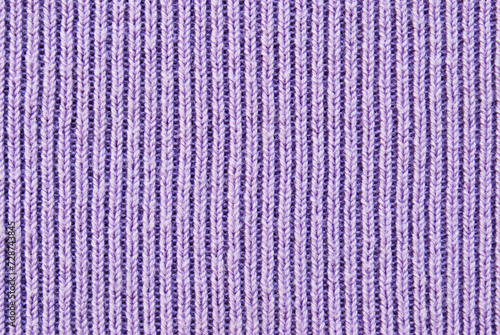 Fotografija Soft purple color ribbed knit fabric pattern close up as background