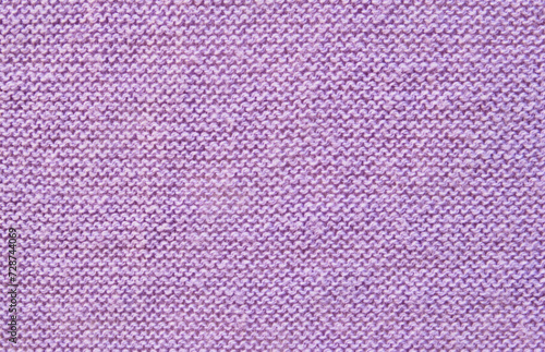 Soft purple color purl knit fabric pattern close up as background
