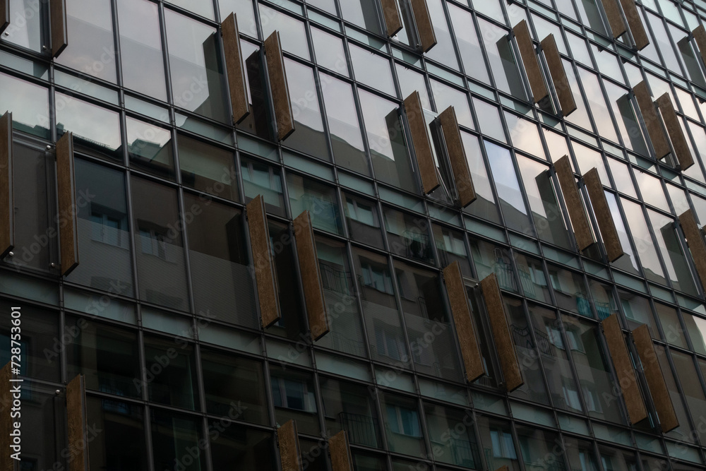 pattern of windows in contemporary glass and concrete building in Warsaw