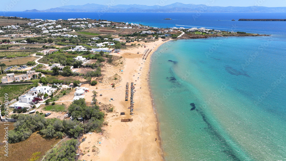 Aerial drone photo of famous for surfers sandy beach of Chrysi Akti or Golden beach with crystal clear emerald sea calm with no wind, Paros island, Cyclades, Greece