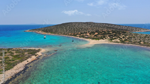 Aerial drone photo of azure paradise blue lagoon of Panteronisi a small islet complex between Paros and Antiparos islands visited by yachts and sail boats, Cyclades, Greece