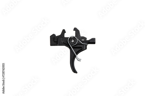 Shock trigger for gun isolate on white back. Gun trigger. Repair spare part.