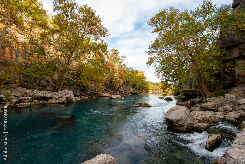 Transparent waters of Kopru River (Köprüçay, ancient Eurymedon) with its emerald green colour in Koprulu Canyon (Köprülü Kanyon) National Park, Antalya, Turkey. It's a rafting paradise