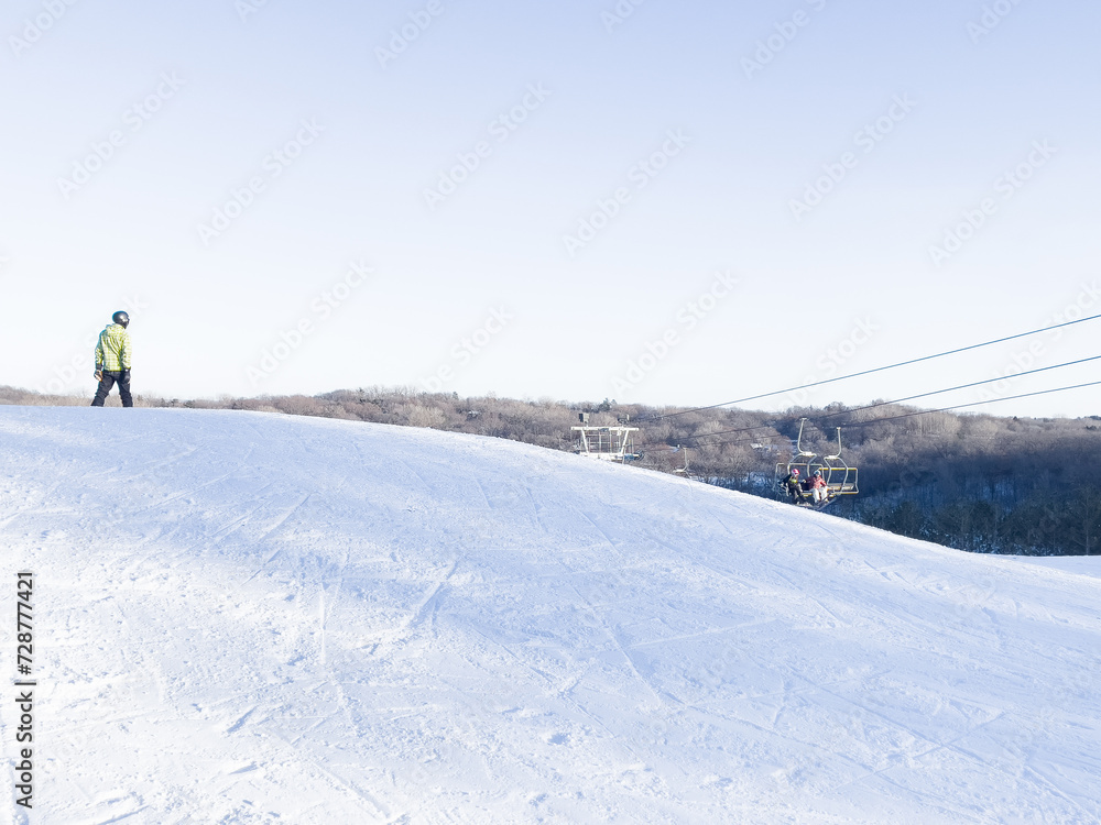 Snowboarder on Top of Hill Viewing The Course Run, Sports Winter Recreation 
