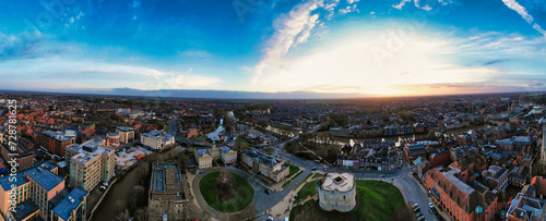 Panoramic aerial view of a city at sunset with dramatic sky and urban landscape in York, North Yorkshire photo