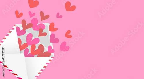 Paper envelope with hearts inside on pink background.