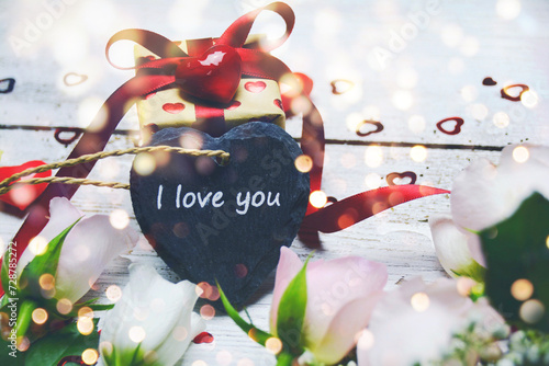 Gift box with heart and text - I love you - Happy Valentine, Mothers Day and Wedding greeting card