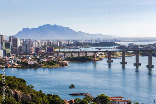 View of the city of Vitória, capital of Espírito Santo, during a beautiful morning with sunshine and blue sea. View from the Penha Convent, in Vila Velha. photo