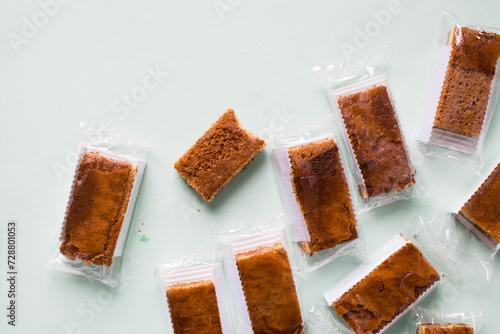 Cakes individually wrapped in plastic packaging, unsustainable product packaging, mini cakes in plastic wrappers wasteful and bad for the environment