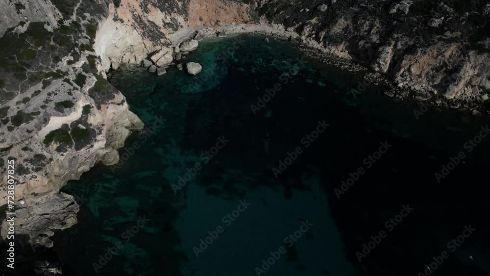 Aerial view with drone of the Sella del Diavolo in Cagliari. Sunny day, crystal clear sea with boats. Aerial view with drone of the Sella del Diavolo in Cagliari. Sunny day, crystal clear sea with boats.