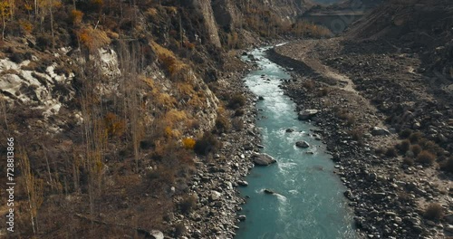 Aerial View of Hunza River surrounded by autumn colors, Hunza Valley, Himalayas, Paksitan