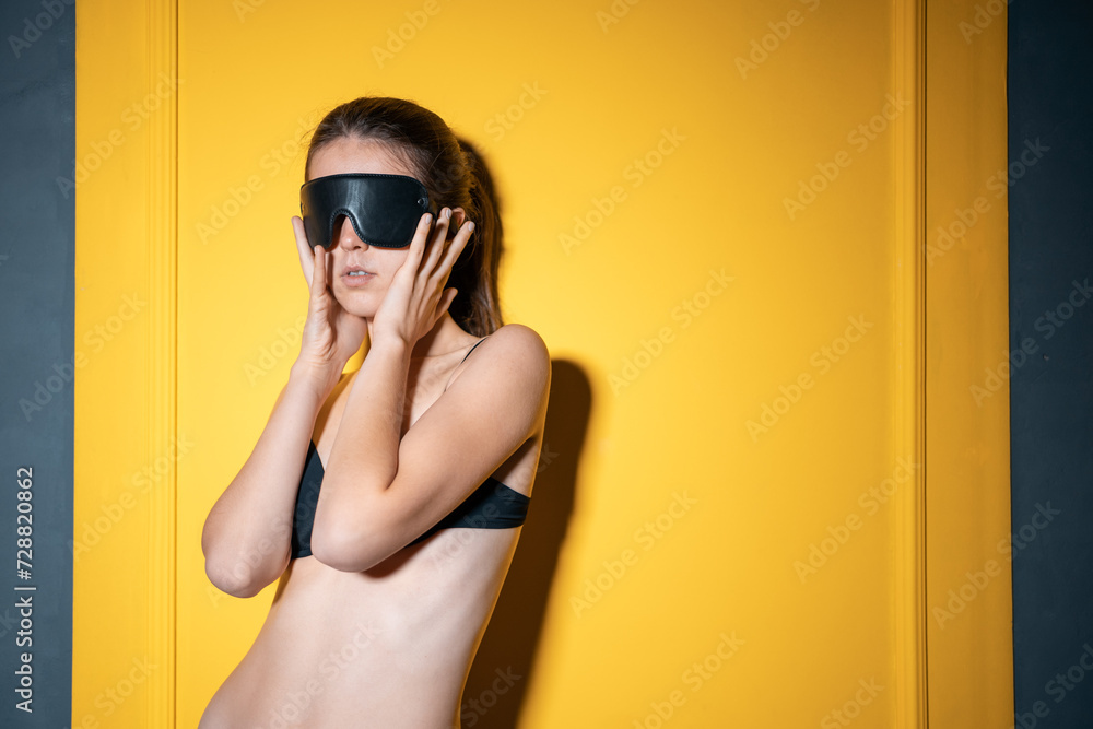 naked sexy woman in leather sleeping mask, nude bdsm female in sleep masking, role play game concept - obrazy, fototapety, plakaty 