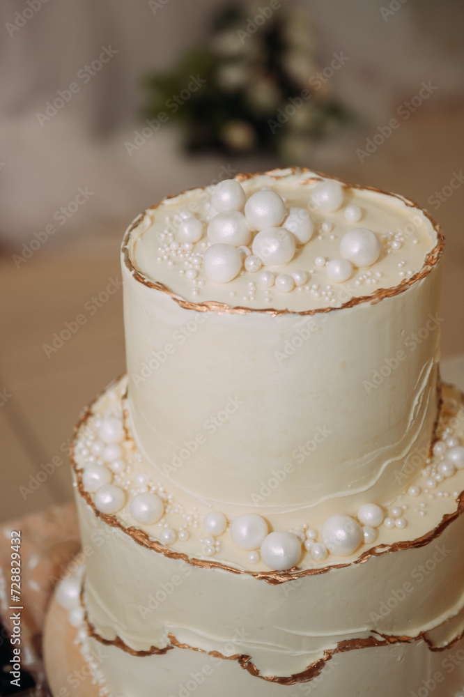 The photo is of a cupcake with white frosting 6111. The photo is of a cupcake with white frosting 6111.