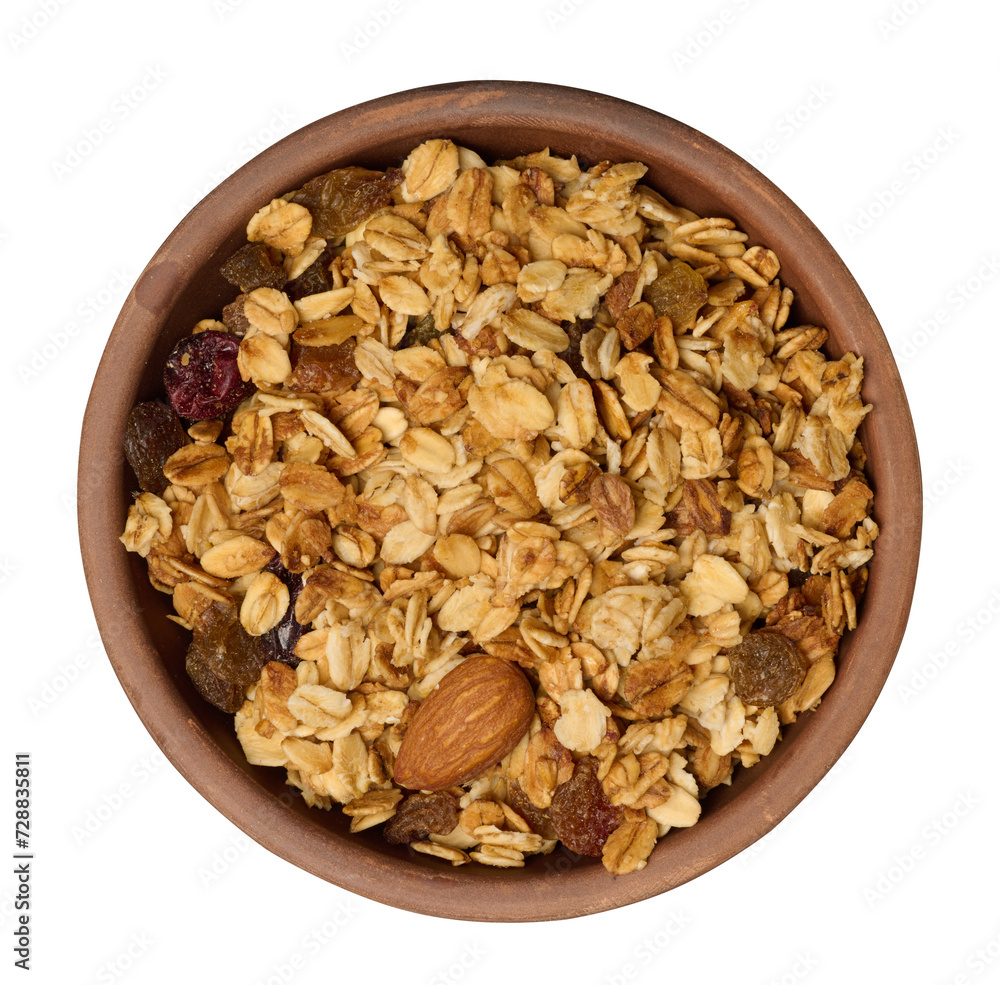 Oatmeal, raisins, cashews and almonds. Granola in round plate Oatmeal, raisins, cashews and almonds. Granola in round plate
