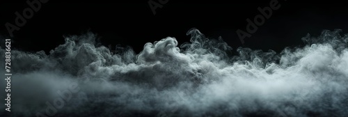 Dense Swirling Fog and Smoke on Dark Background - Mysterious and Spooky Atmospheric Effect