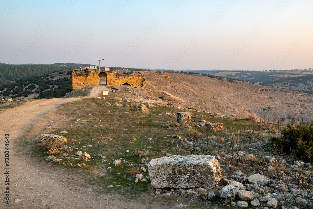 Fototapeta premium Ruins of Blaundus ancient city in Usak province of Turkey. View at sunrise. The ancient city was in the Roman province of Lydia. Usak, Turkey.