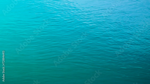 Background of the water surface of the Salzach river. Texture of water of a mountain river.