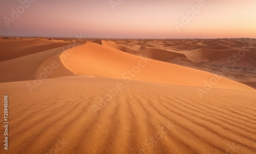 Golden sunset over a serene desert landscape © Andrey