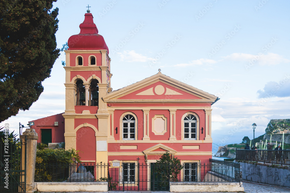 Obraz premium Corfu street view, Kerkyra old town beautiful cityscape, Ionian sea Islands, Greece, a summer sunny day, pedestrian streets with shops and cafes, architecture of historic center, travel to Greece