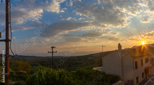 Agioi douloi village sunrise,Greece photo
