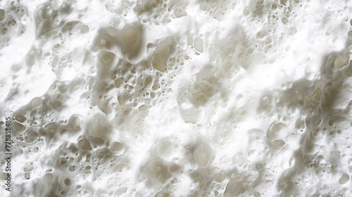  a close up of a white substance with a lot of white stuff on the bottom of the image and a lot of white stuff on the bottom of the image.