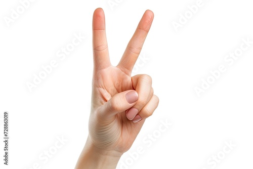 Close up of a female hand showing the victory and peace sign isolated on a white background