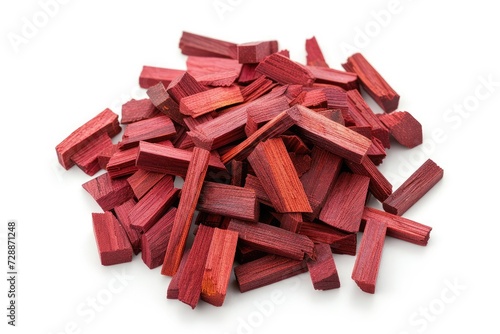 Top view of red sandalwood incense chips on a white background Also known as sanderwood rubywood or red saunders photo
