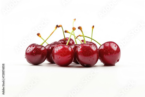 A close-up image showcasing the vibrant red hue and delicate dew drops on a group of fresh cherries. The white background highlights their color and freshness.