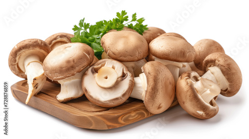 A fresh champignon mushroom isolated on a white background. The image features a single, whole, uncooked champignon on a rustic wooden board with herbs.