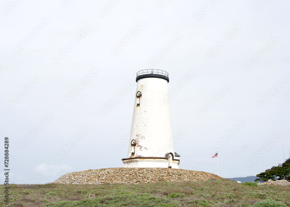 Piedras Blancas lighthouse on the California central coast at Point Piedras Blancas, about 5.5 miles west by northwest of San Simeon, CA. Piedras Blancas lighthouse on the California central coast at Point Piedras Blancas, about 5.5 miles west by northwest of San Simeon, CA.
