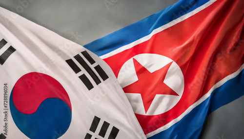 Flags of North and South Korea waving side by side, symbolizing the delicate balance between peace and conflict on the Korean Peninsula photo