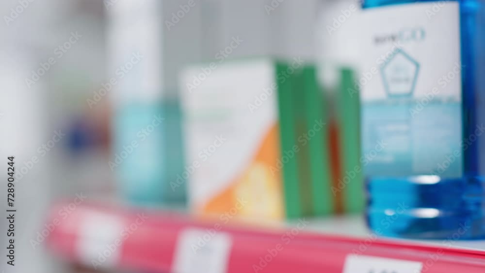 Selective focus of pills boxes and bottles on drugstore shelves, packages of prescription medicine or disease remedy for sale in empty pharmacy. Diversity of medicaments and vitamins, healthcare. Selective focus of pills boxes and bottles on drugstore shelves, packages of prescription medicine or disease remedy for sale in empty pharmacy. Diversity of medicaments and vitamins, healthcare.