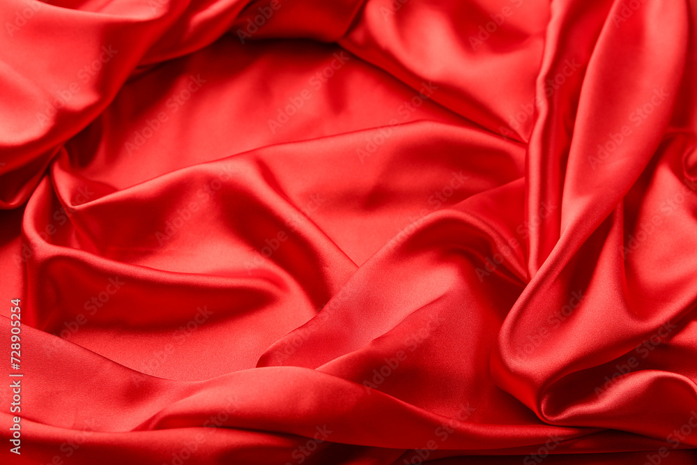 Closeup view of crumpled red silk fabric as background Closeup view of crumpled red silk fabric as background
