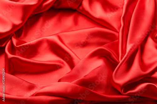 Closeup view of crumpled red silk fabric as background