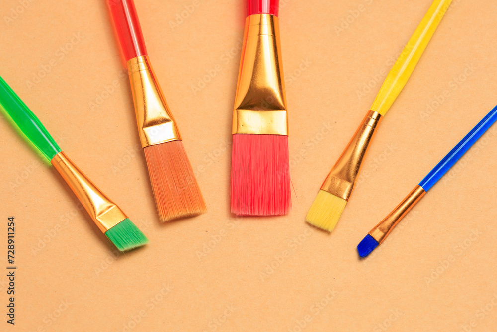 Fototapeta premium Paint brushes. Background with selective focus and copy space