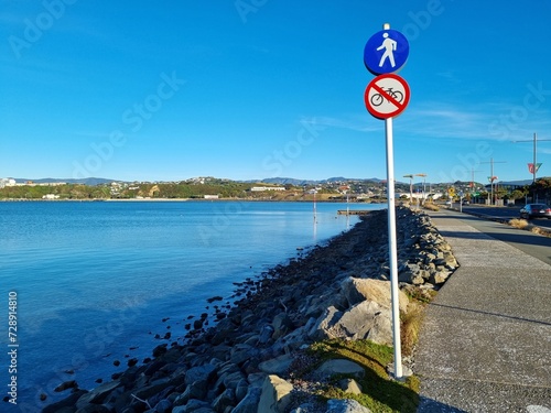 Crooked sign down by the seaside