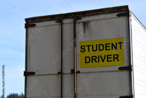 Student Driver sign posted on back of Tractor Trailer. photo