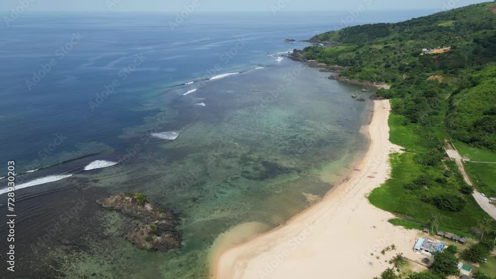 Breathtaking aerial drone shot of gorgeous coastline of white sand tropical island resort in Catanduanes, Philippines. Breathtaking aerial drone shot of gorgeous coastline of white sand tropical island resort in Catanduanes, Philippines.