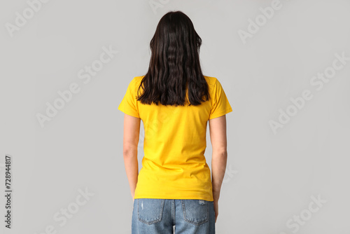 Young woman in stylish yell...