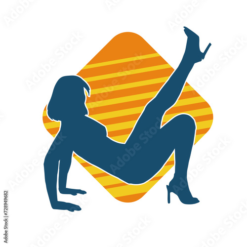 Silhouette of a sexy female doing seductive dance