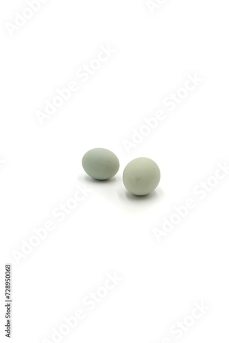 2 salted eggs on a white background